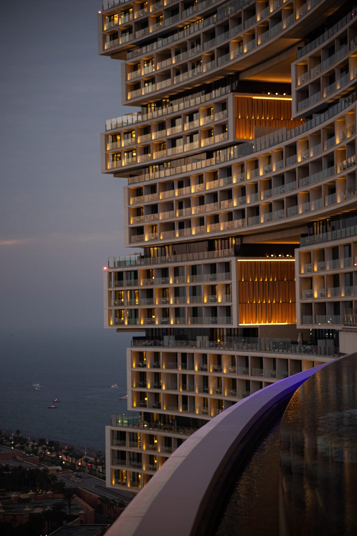Luxury resort tower at dusk, filmed by Illumino Media